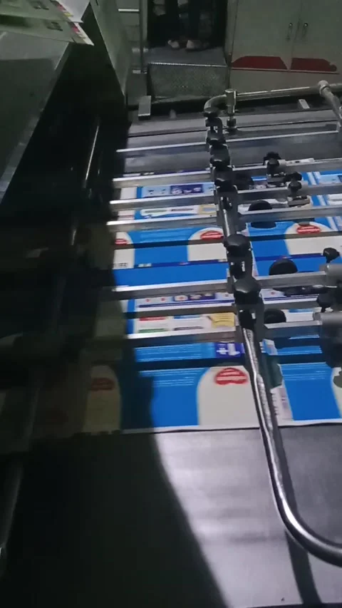 Uv machine varnish process Stock Footage 220611291