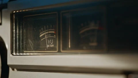UV needle moving inside audio scale on vintage tuner closeup. Macro volume meter Stock Footage 332666481