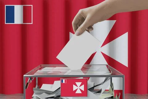 Uvea flag, hand dropping ballot card into a box - voting/ election concept -  Illustration