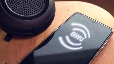 UWB wireless speaker connecting to a smartphone Stock Footage 142257065