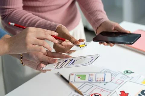 UX and UI Design Process with Sketches and Smartphone Stock Photos