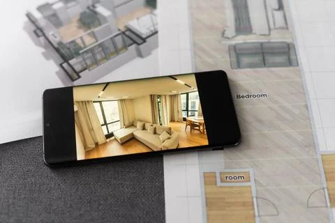 UX designer working on the mobile application experience sketching drawings at Foto stock
