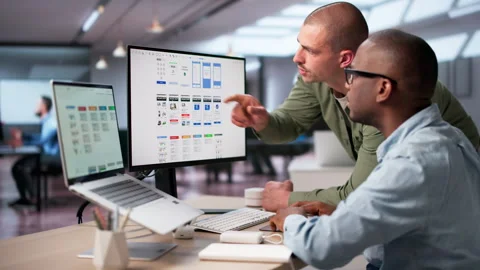 UX Designers Collaborating Closely To Improve User Interface Video stock 334922288