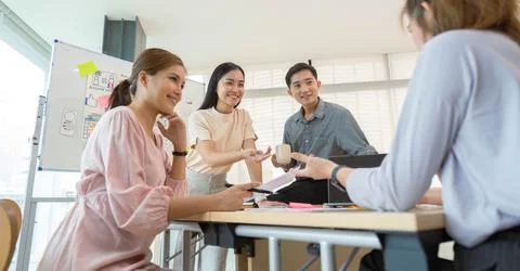 Ux developer and ui designer presenting and testing mobile app interface Stock Photos