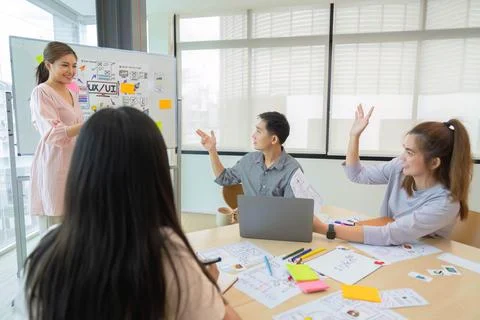 Ux developer and ui designer presenting and testing mobile app interface design Stock Photos