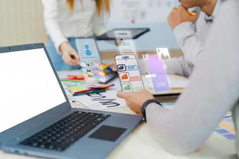 Ux developer and UI designer team brainstorm together about designing 写真素材