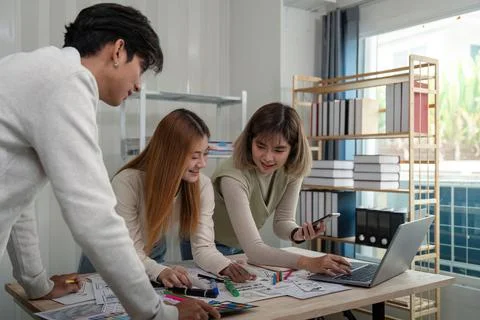 UX Developer and UI Designer Team Collaboration and Brainstorming Ideas in 写真素材
