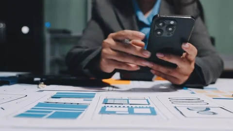 Ux developers and ui designers, data researchers brainstorm on tabletop mob.. Stock Footage 285014789