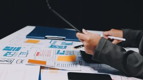 Ux developers and ui designers, data researchers brainstorm on tabletop mob.. Stock Footage 285014820