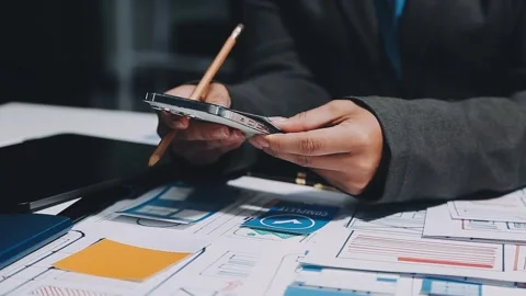 Ux developers and ui designers, data researchers brainstorm on tabletop mob.. Stock Footage 285014849