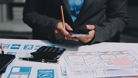 Ux developers and ui designers, data researchers brainstorm on tabletop mob.. Stock Footage 285014850