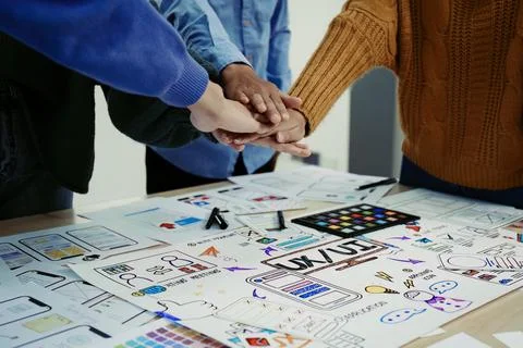 Ux developers and ui designers use augmented reality to brainstorm on mobile app Stock Photos
