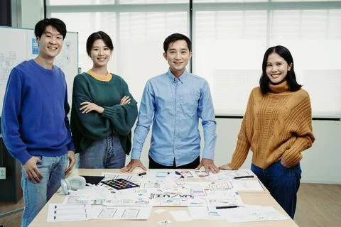 Ux developers and ui designers use augmented reality to brainstorm on mobile app Stock Photos