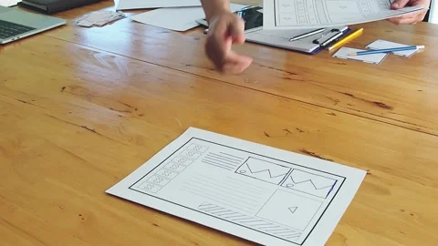 UX or UI designers preparing layout prototype before meeting. Stock Footage 157905651
