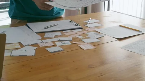 UX or UI designers preparing mockup layout prototype before meeting. Stock Footage 163094107