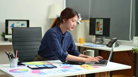 UX UI designer planning mobile layout with sticky notes in modern office. C.. Stock Footage 312849355
