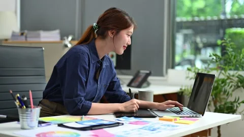 UX UI designer planning mobile layout with sticky notes in modern office. C.. Video stock 312849366