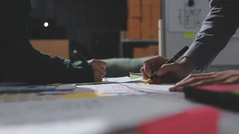 UXUI design brainstorming session with sketches and digital tools Stock Footage 324849077