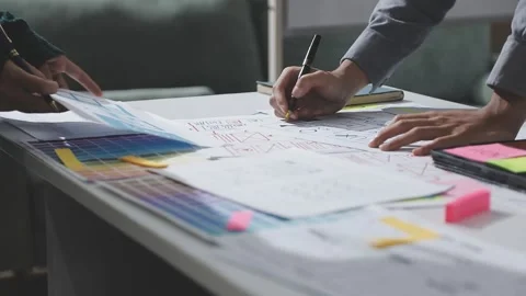 UXUI design brainstorming session with sketches and digital tools Stock Footage 324849119