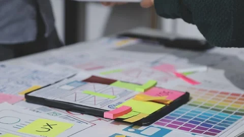 UXUI design brainstorming session with sketches and digital tools 動画素材 324849215