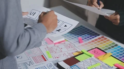 UXUI design brainstorming session with sketches and digital tools 動画素材 324849272