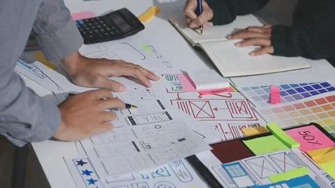 UXUI design brainstorming session with sketches and digital tools 動画素材 324849309