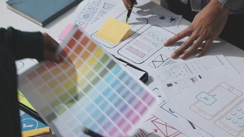 UXUI design brainstorming session with sketches and digital tools 動画素材 324849326