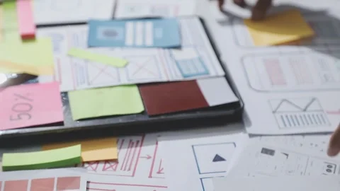 UXUI design brainstorming session with sketches and digital tools 動画素材 324849329