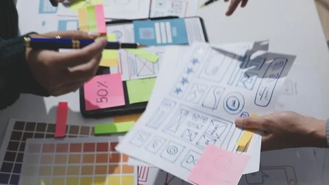 UXUI design brainstorming session with sketches and digital tools 動画素材 324849338