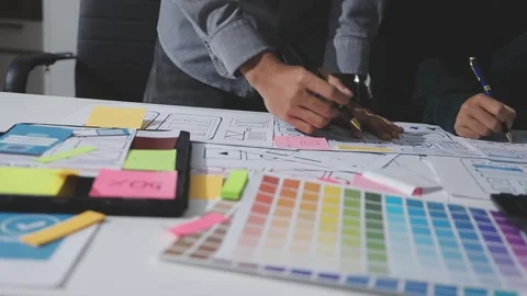 UXUI design brainstorming session with sketches and digital tools 動画素材 324849451