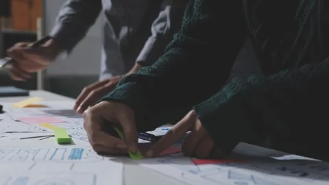 UXUI design brainstorming session with sketches and digital tools 動画素材 324849484