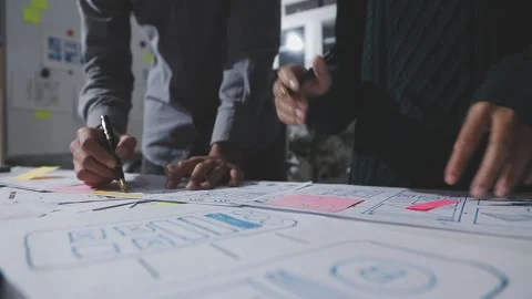 UXUI design brainstorming session with sketches and digital tools 動画素材 324849489