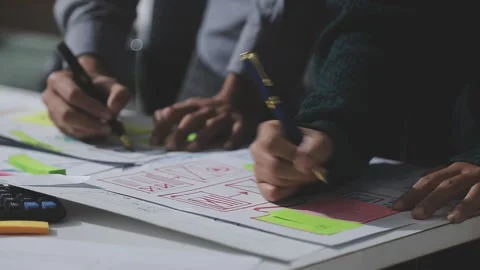 UXUI design brainstorming session with sketches and digital tools 動画素材 324849578