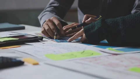 UXUI design brainstorming session with sketches and digital tools 動画素材 324849600