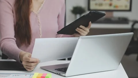 UX/UI designer working on wireframes for a website and mobile app prototype.. Stock Footage 309837154