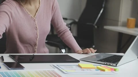 UX/UI designer working on wireframes for a website and mobile app prototype.. Stock Footage 309837169