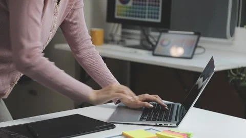 UX/UI designer working on wireframes for a website and mobile app prototype.. Stock Footage 309837175