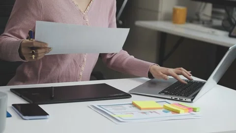 UX/UI designer working on wireframes for a website and mobile app prototype.. Stock Footage 309837181