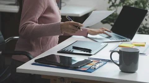 UX/UI designer working on wireframes for a website and mobile app prototype.. Stock Footage 309837190