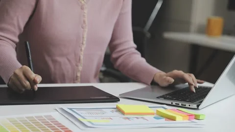 UX/UI designer working on wireframes for a website and mobile app prototype.. Stock Footage 309837267