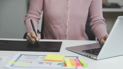 UX/UI designer working on wireframes for a website and mobile app prototype.. Stock Footage 309837269