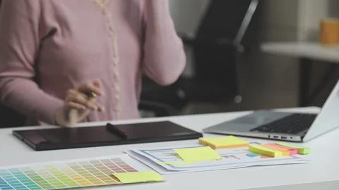 UX/UI designer working on wireframes for a website and mobile app prototype.. Stock Footage 309837284