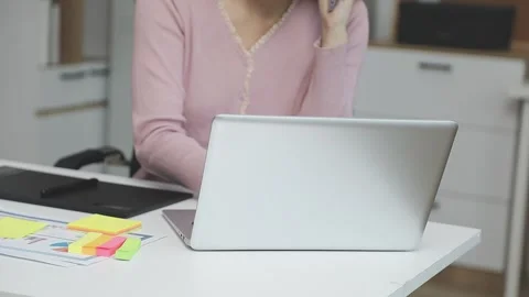 UX/UI designer working on wireframes for a website and mobile app prototype.. Stock Footage 309837285