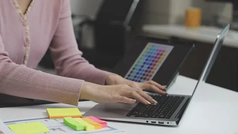 UX/UI designer working on wireframes for a website and mobile app prototype.. Stock Footage 309837314