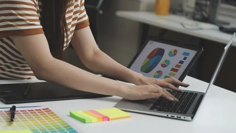 UX/UI designer working on wireframes for a website and mobile app prototype.. Stock Footage 309837322