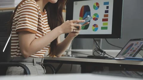 UX/UI designer working on wireframes for a website and mobile app prototype.. Stock Footage 309837402
