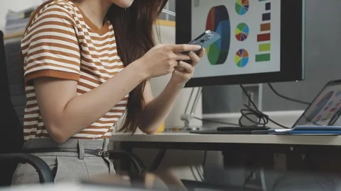 UX/UI designer working on wireframes for a website and mobile app prototype.. Stock Footage 309837441