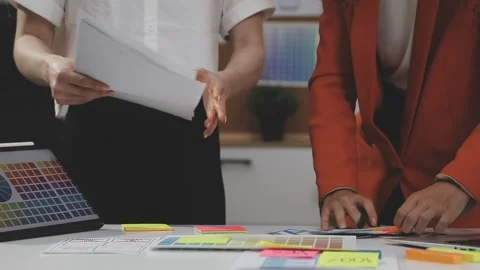 UX/UI designer working on wireframes for a website and mobile app prototype.. Stock Footage 309837767