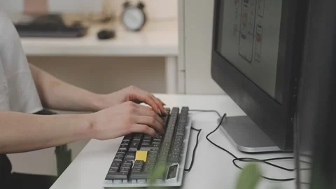 UX/UI designer working on wireframes for a website and mobile app prototype.. Stock Footage 309837919