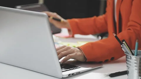 UX/UI designer working on wireframes for a website and mobile app prototype.. Stock Footage 309837935